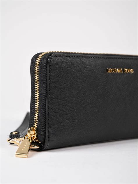 michael kors womens travel continental money pieces logo wristlet wallet|Michael Kors monogram wallet.